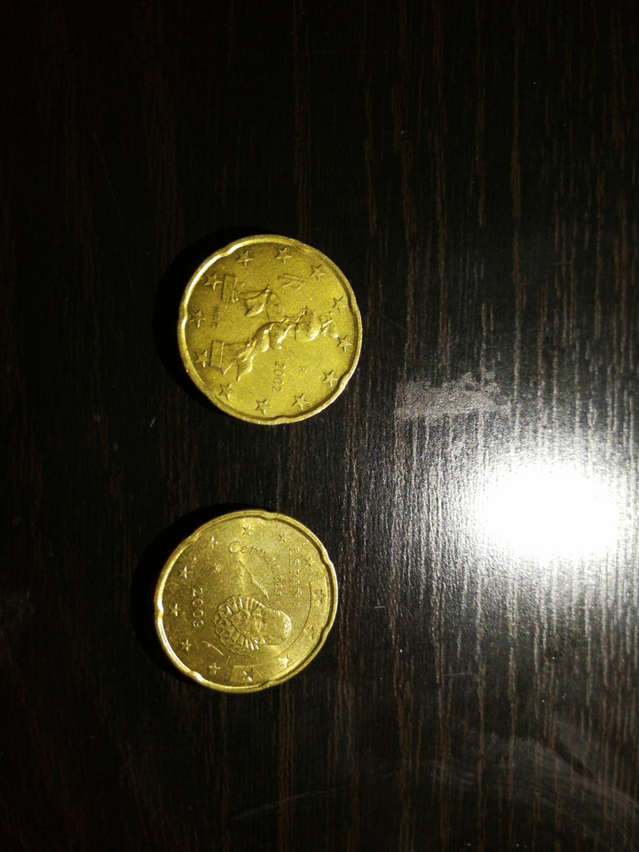 欧元硬币背面有多少种图案?