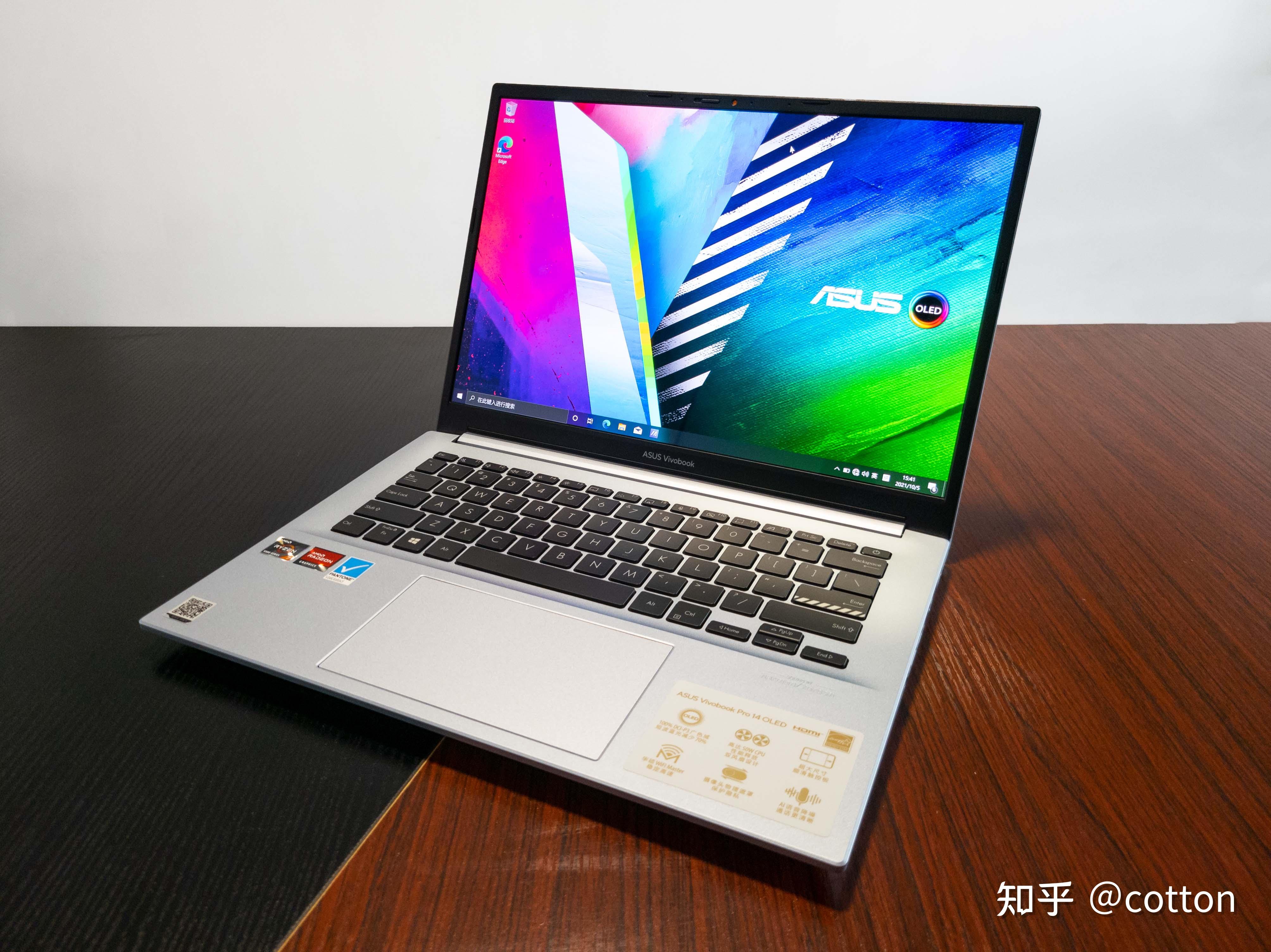 a面采用了金属材质,中间有采用浮雕工艺的"asus vivobook"标志.