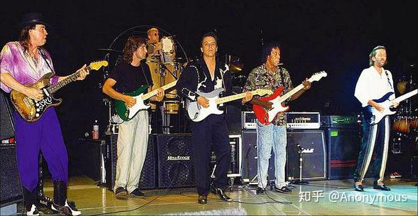 左1 srv, 右1 eric clapton, 右2 buddy guy, 右3 jimmie vaughan