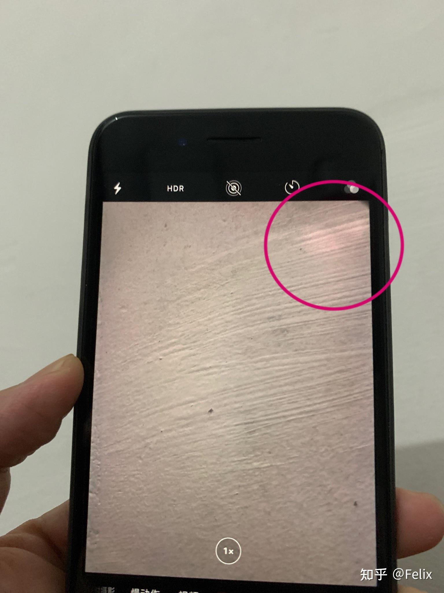 iphonex后置摄像头拍照出现了紫色斑点图片标注地方有没有什么解决