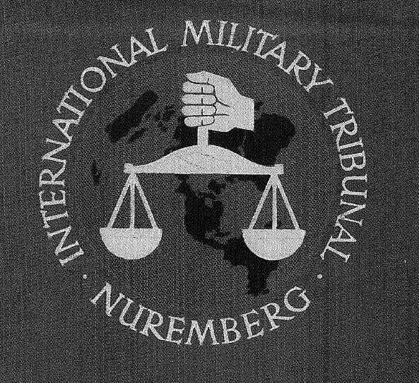 hanging in orderly rows were the clothes of prisoners who had