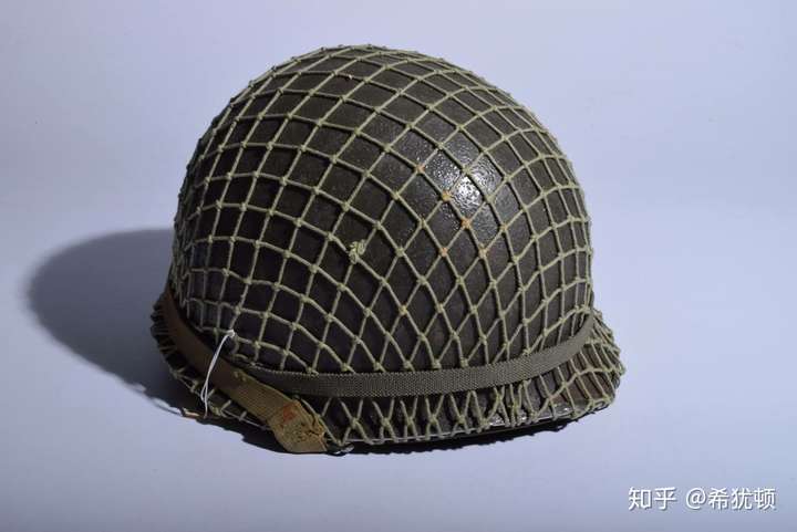 为什么二战美军钢盔上都有网?