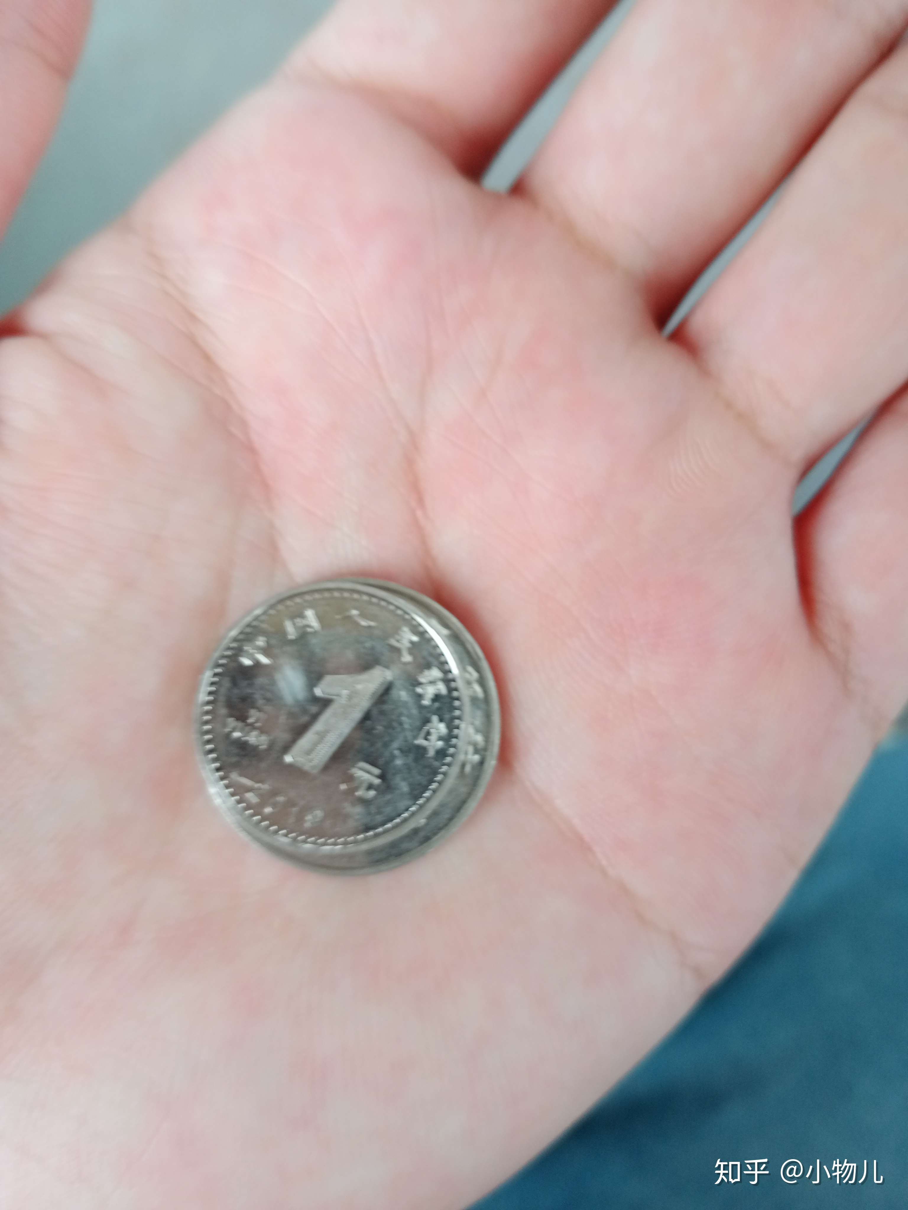 麦穗儿 的想法: 新版一元钢镚缩水了? - 知乎