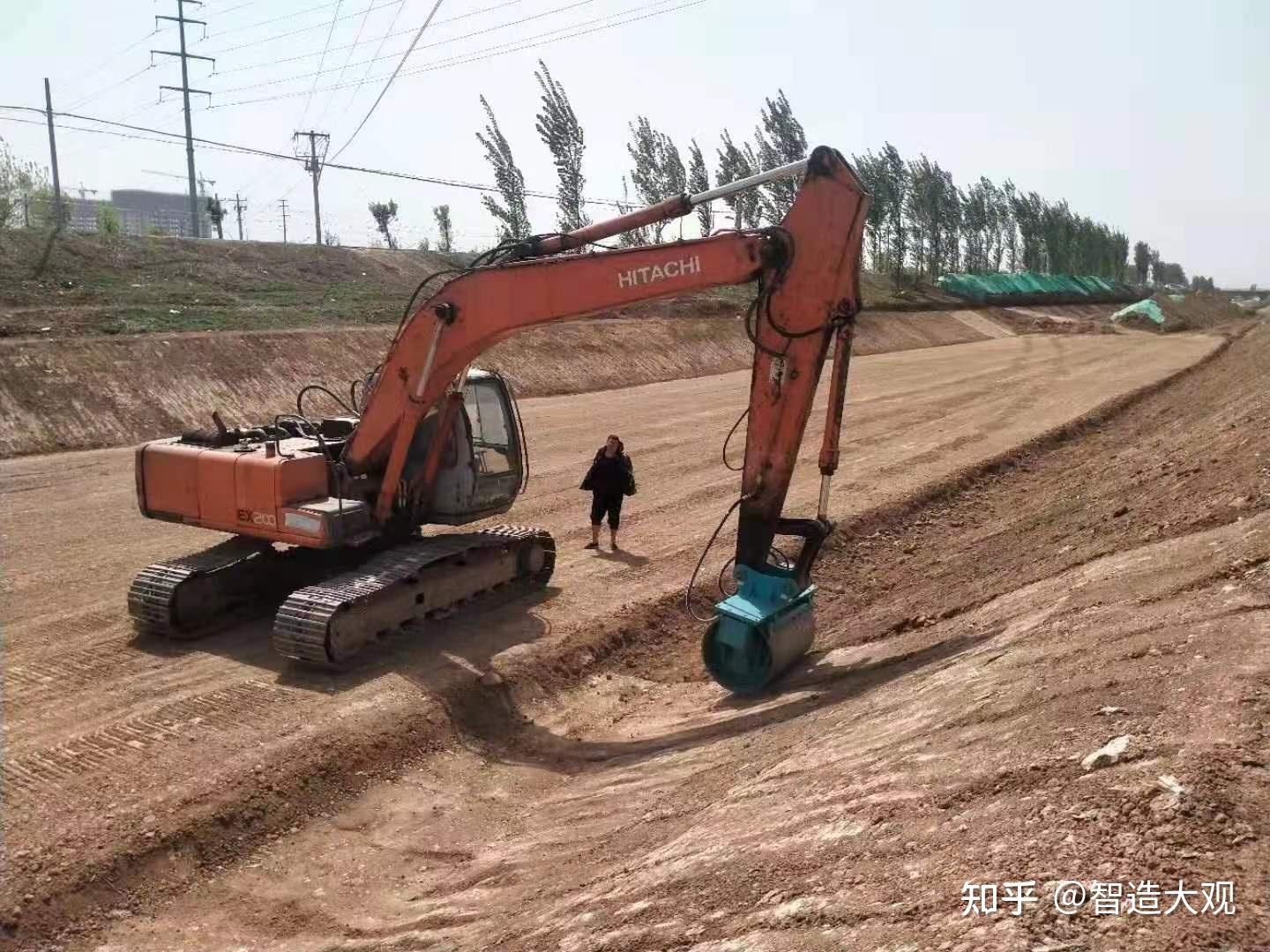 钩机滚筒夯,震动压路碾,图片 - 知乎