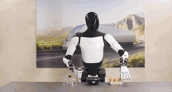 特斯拉人形机器人optimus第二代亮相走的更快重量更轻轻松拿捏鸡蛋