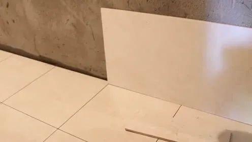 卫生间瓷砖墙压地还是地压墙