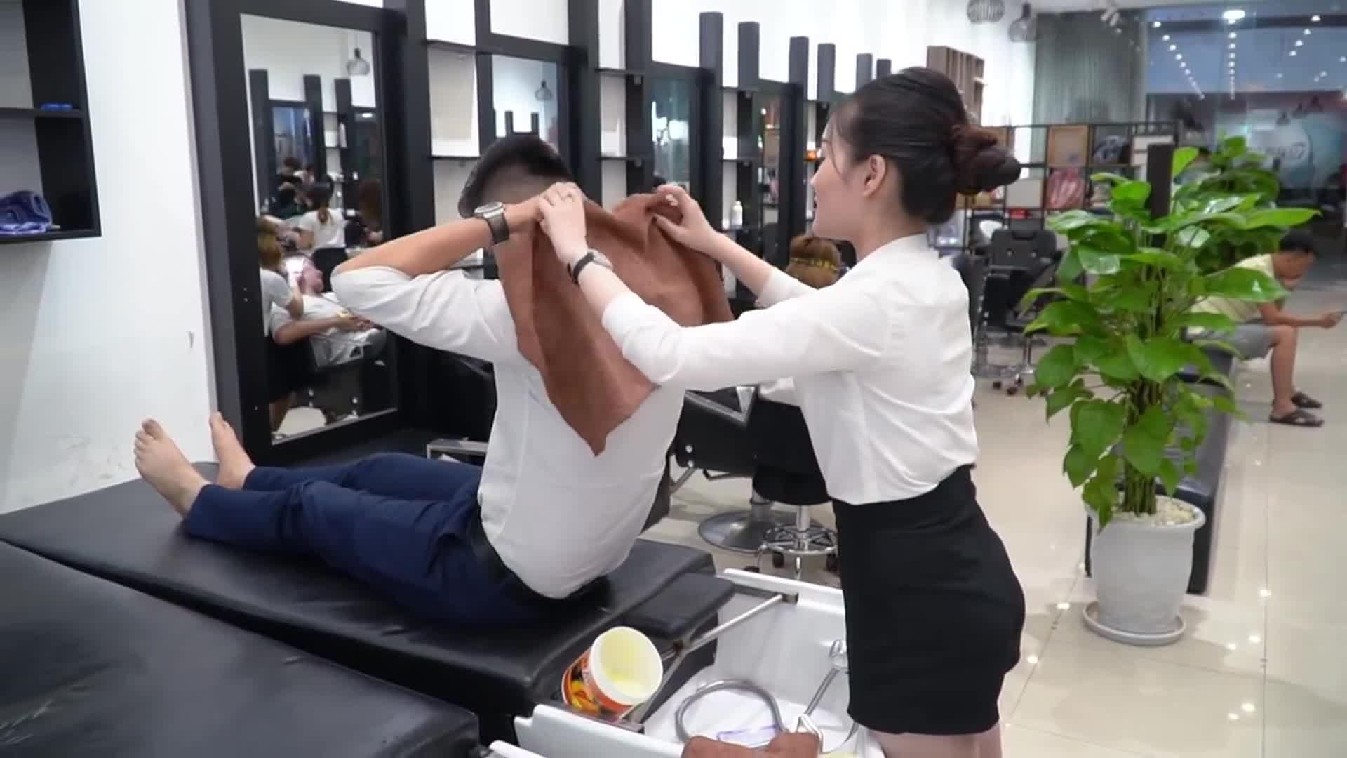 越南理发店按摩洗头图片