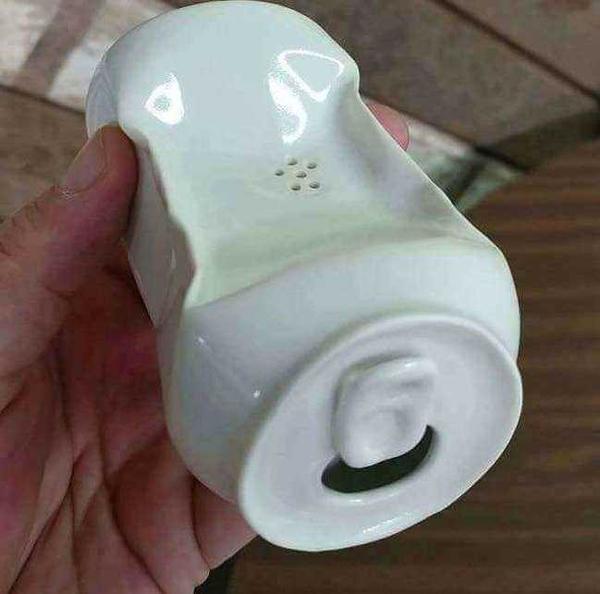 看起来像个捏扁了的易拉罐,其实.是一个肥皂盒