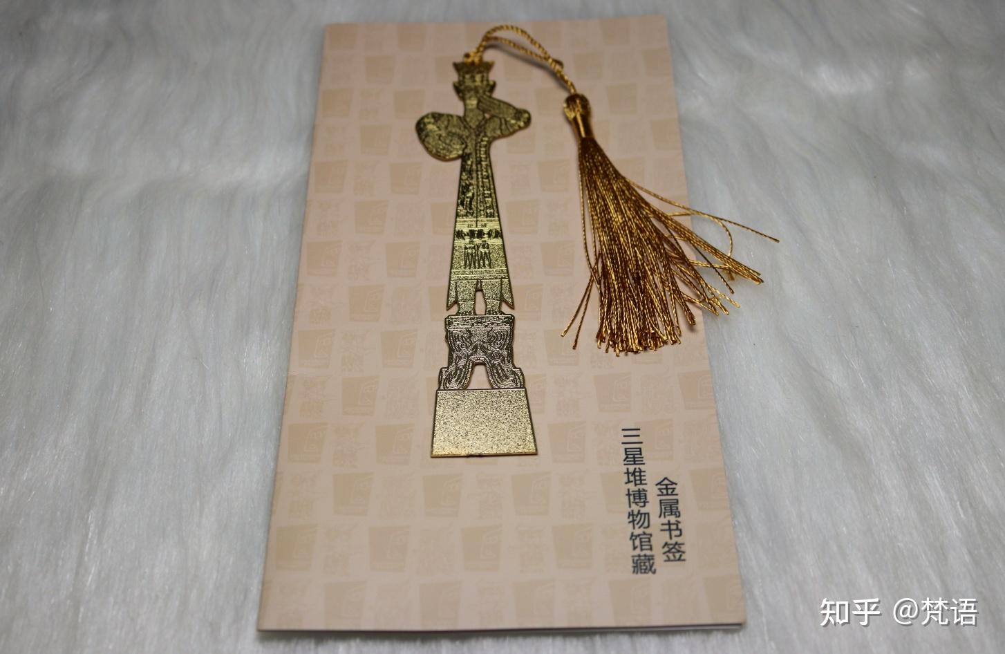 经典与时尚的三星堆形象文创书签,材质:铜.