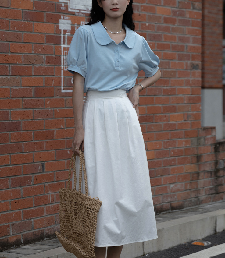 白色半身裙应该搭配什么上衣