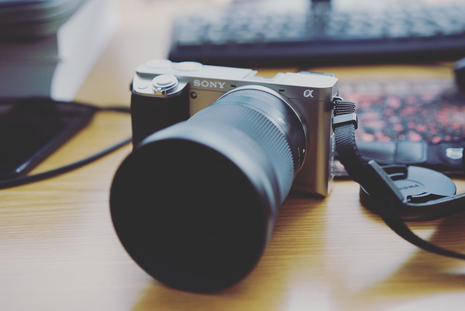 Sony a6000+sigma 30mm F1.4和富士xt20怎么