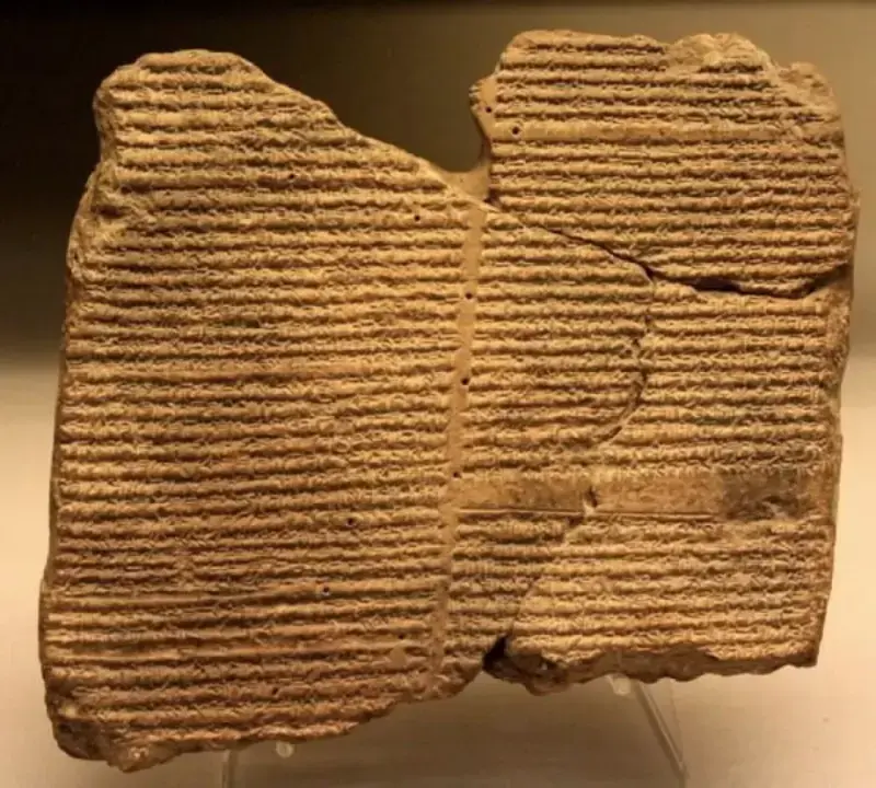 公元前3000年,苏美尔一个苏美尔人在泥板上认真地画着一个符号.