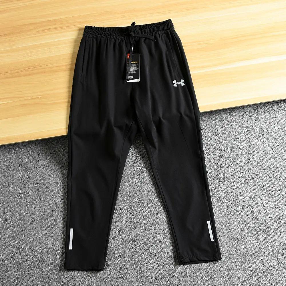 ua安德玛三色夏季反光logo脉冲透气孔速干弹力收口小脚运动长裤