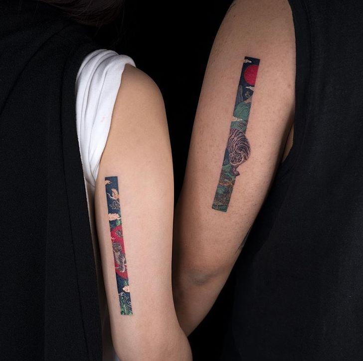 eq创造了独特醒目的纹身作品,图案的所有细节都包含在了一个长条的