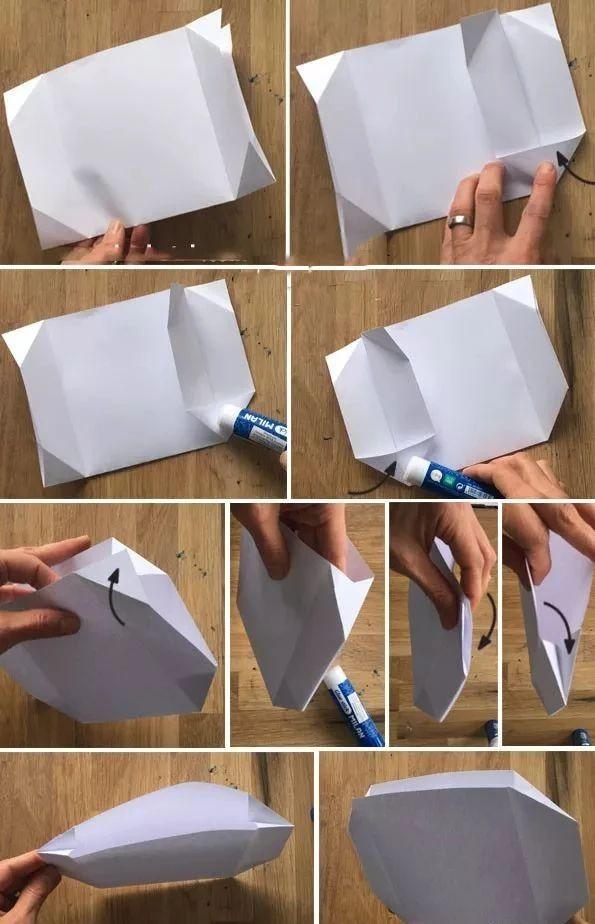 用白色纸条给包包封口,里外都粘上固定才更稳妥~ 再用黑色纸条做一个