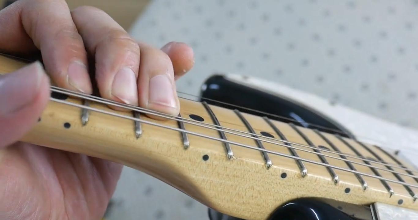 "弦高有问题,怎么办?