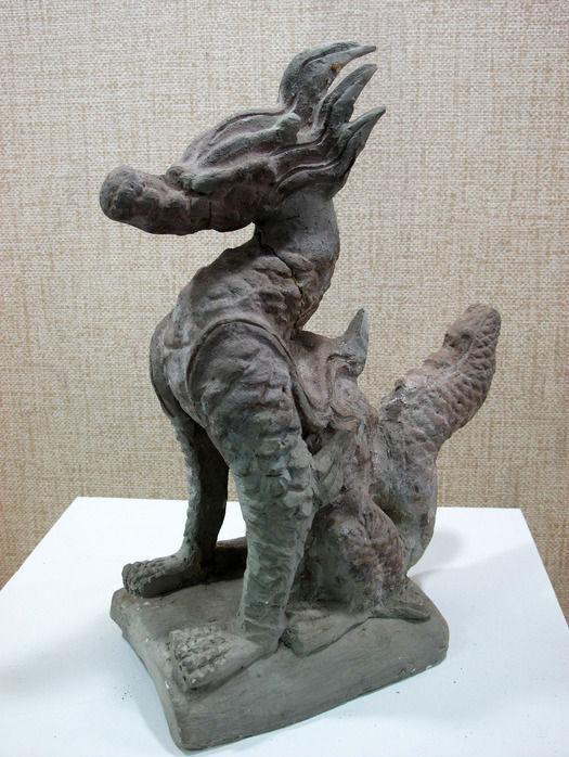 老二睚眦,嗜杀喜斗,刻镂于刀环,剑柄吞口.