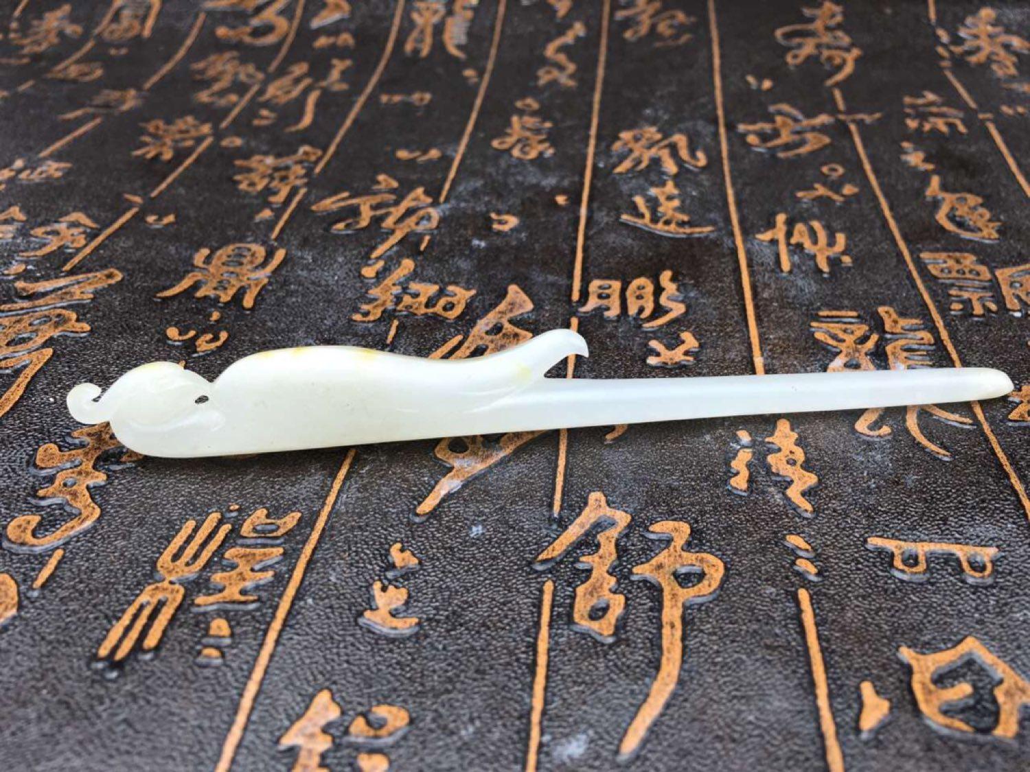 天地空搔首频抽白玉簪玉器题材