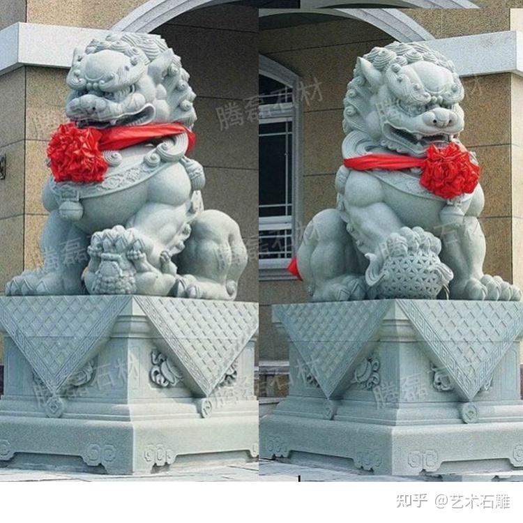 石雕狮子一对精致的石雕狮子石雕狮子寺庙摆放