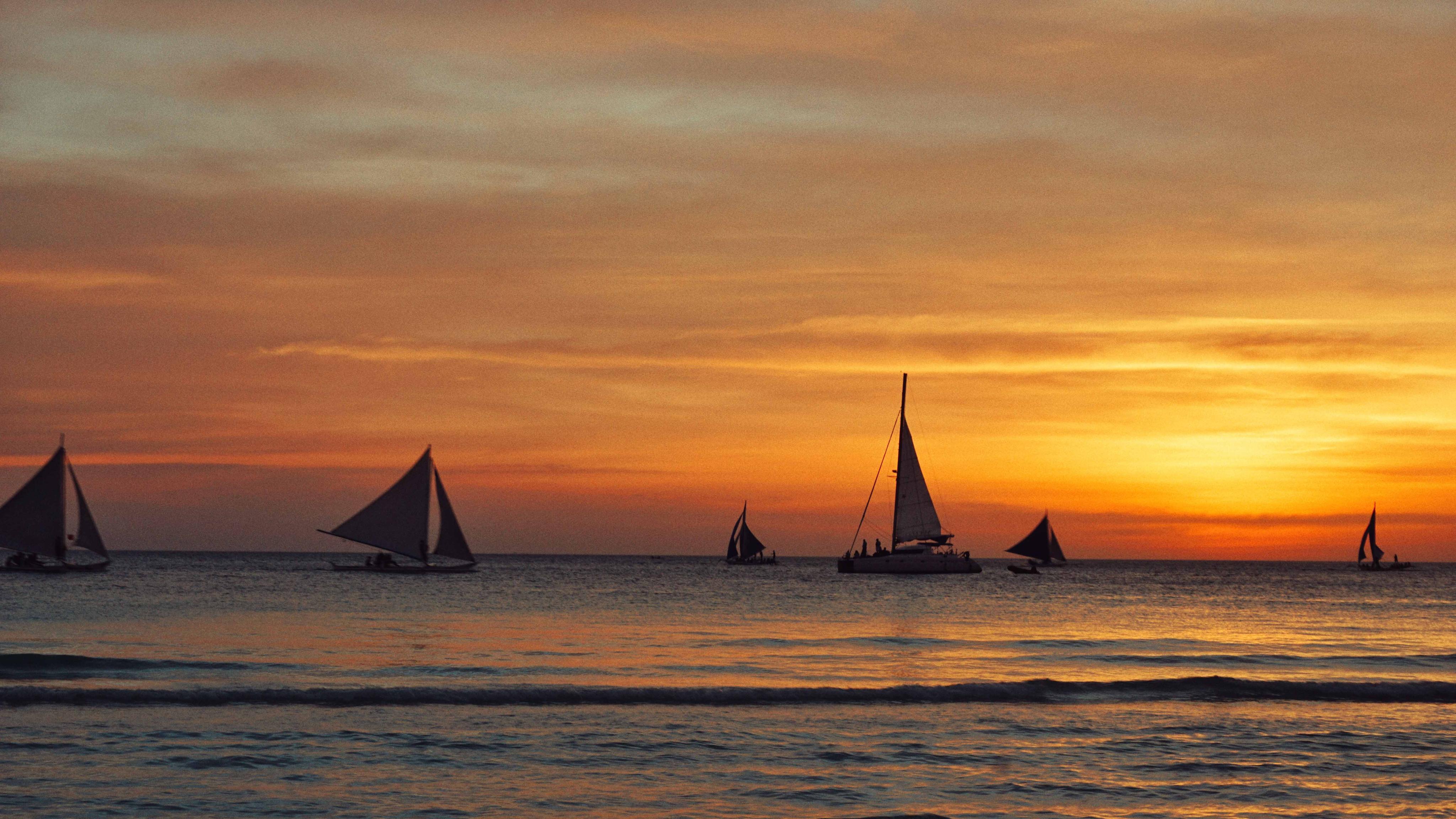 2023长滩岛落日风帆体验玩乐攻略,当风帆随风迎着落日驶向大海...【去哪儿攻略】