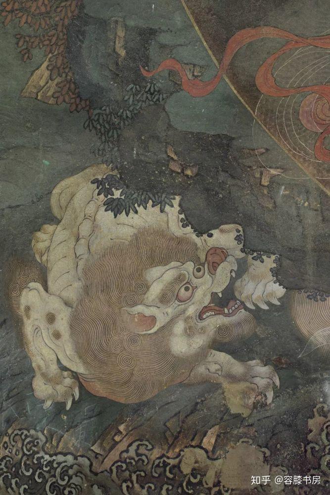 水月观音像中金毛犼鹦鹉位于水月观音像左上部.