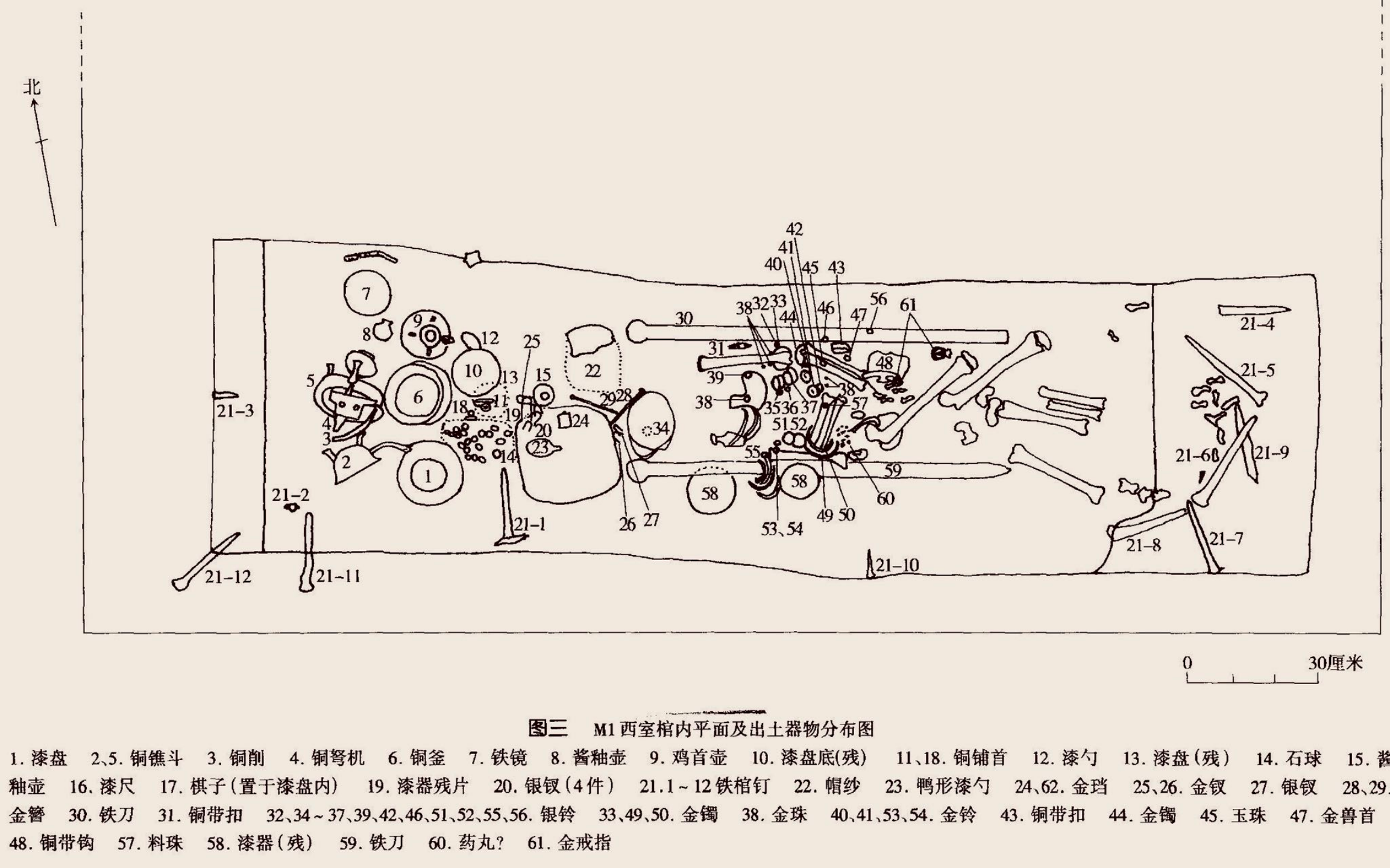 发掘左侧墓室时尸骨和陪葬品摆放位置