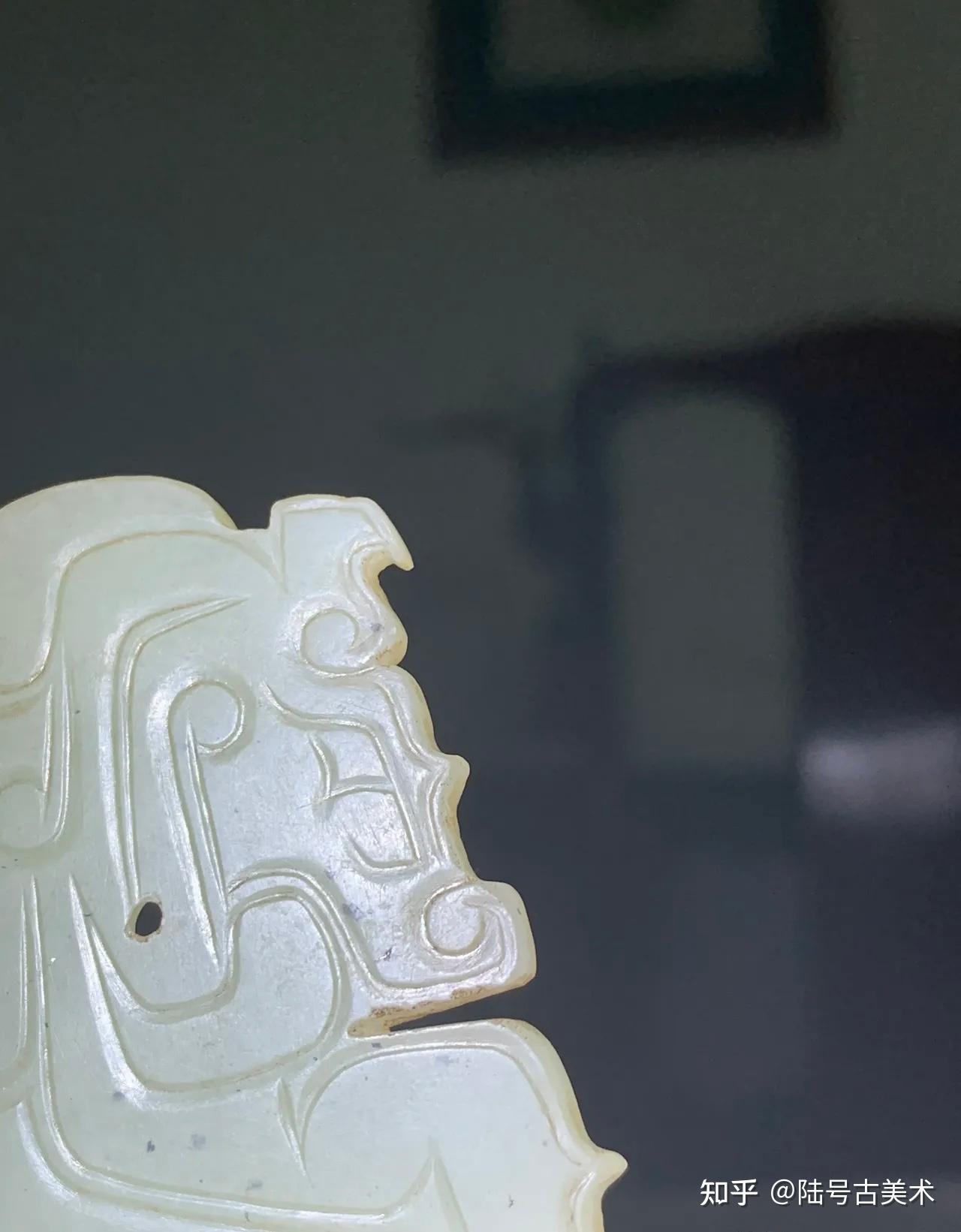 西周神人龙首合体玉佩