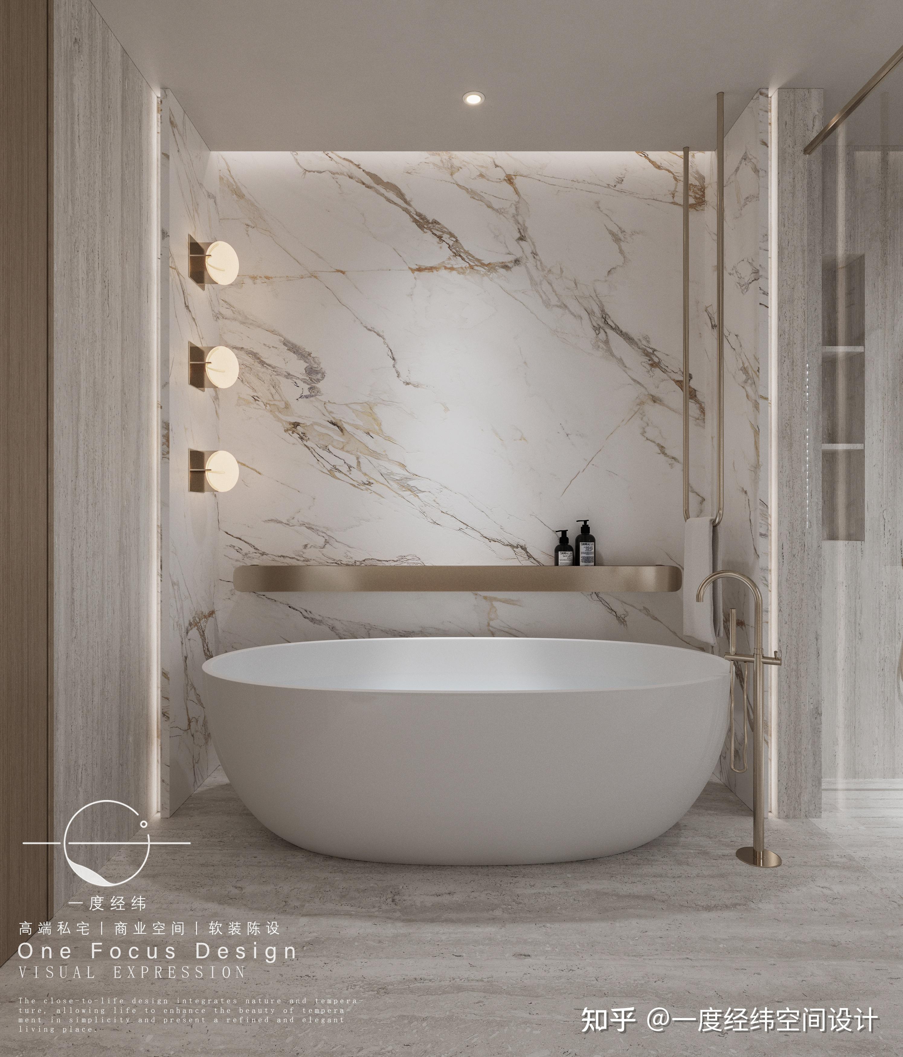 浴缸背景采用轻奢的高档石材结合金属做出的造型,柔和的灯光相互碰撞