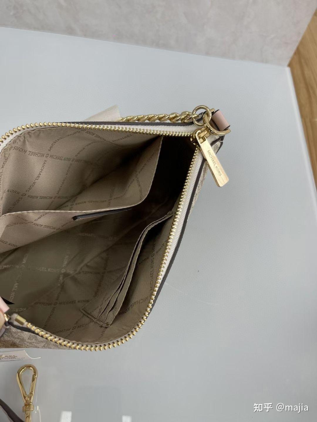 mk麻将腋下包67